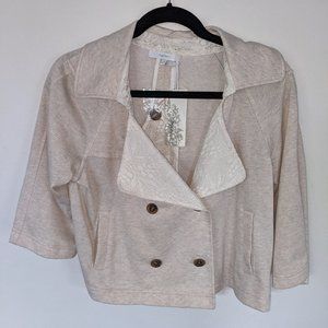 Soft cream colored jacket with lace and pockets